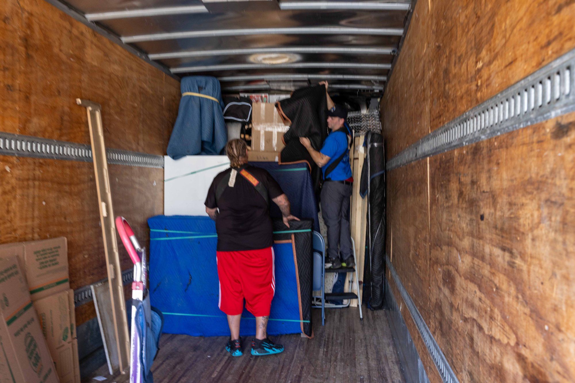 Midas Touch Movers Loading Truck Wide Shot