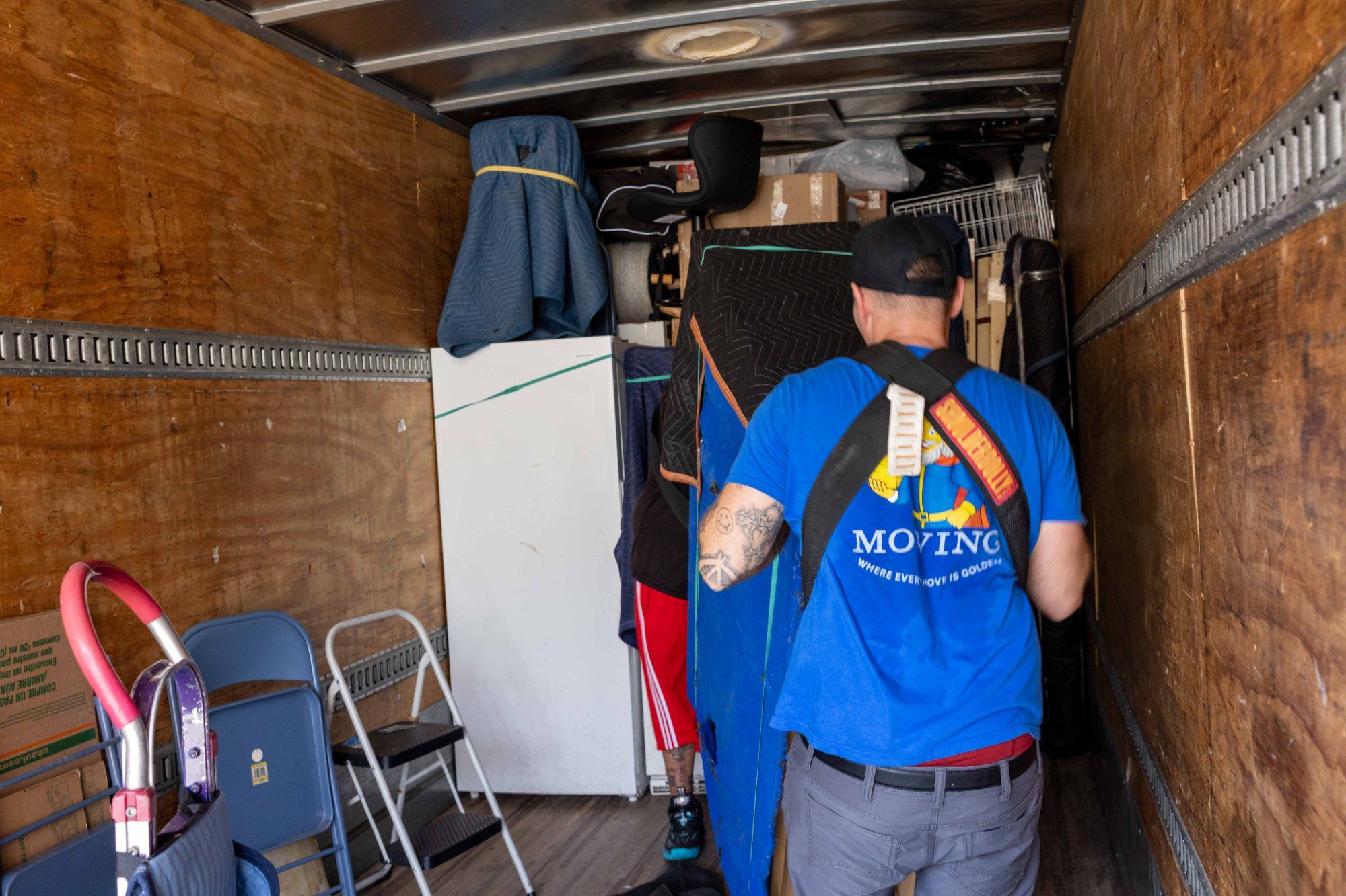 Midas Touch Moving crew working together inside the truck during a commercial move in Sevierville TN